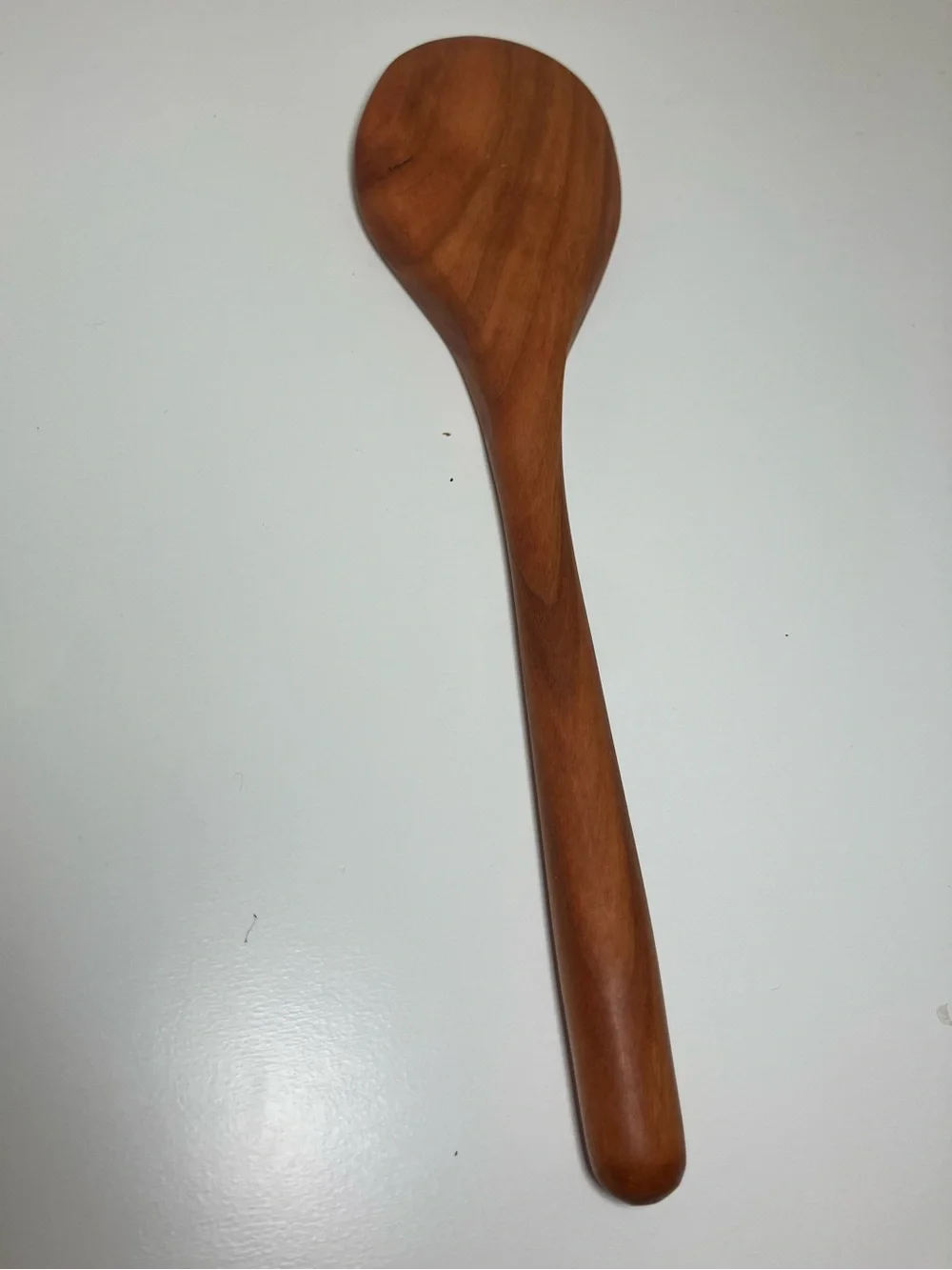 Daisymaeshop Handcarved 8 inch wooden spoon made from cherry wood.